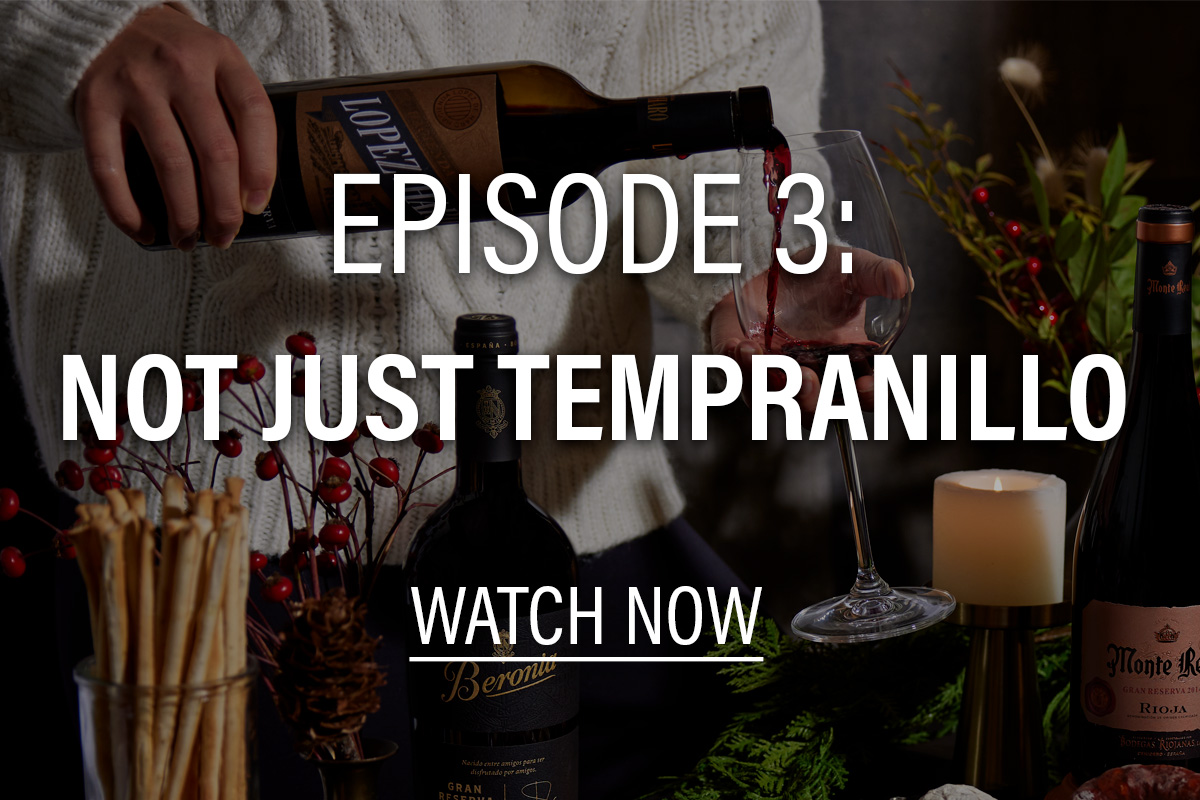 woman in a white sweater pouring wine; text overlay episode 3: not just tempranillo, watch now