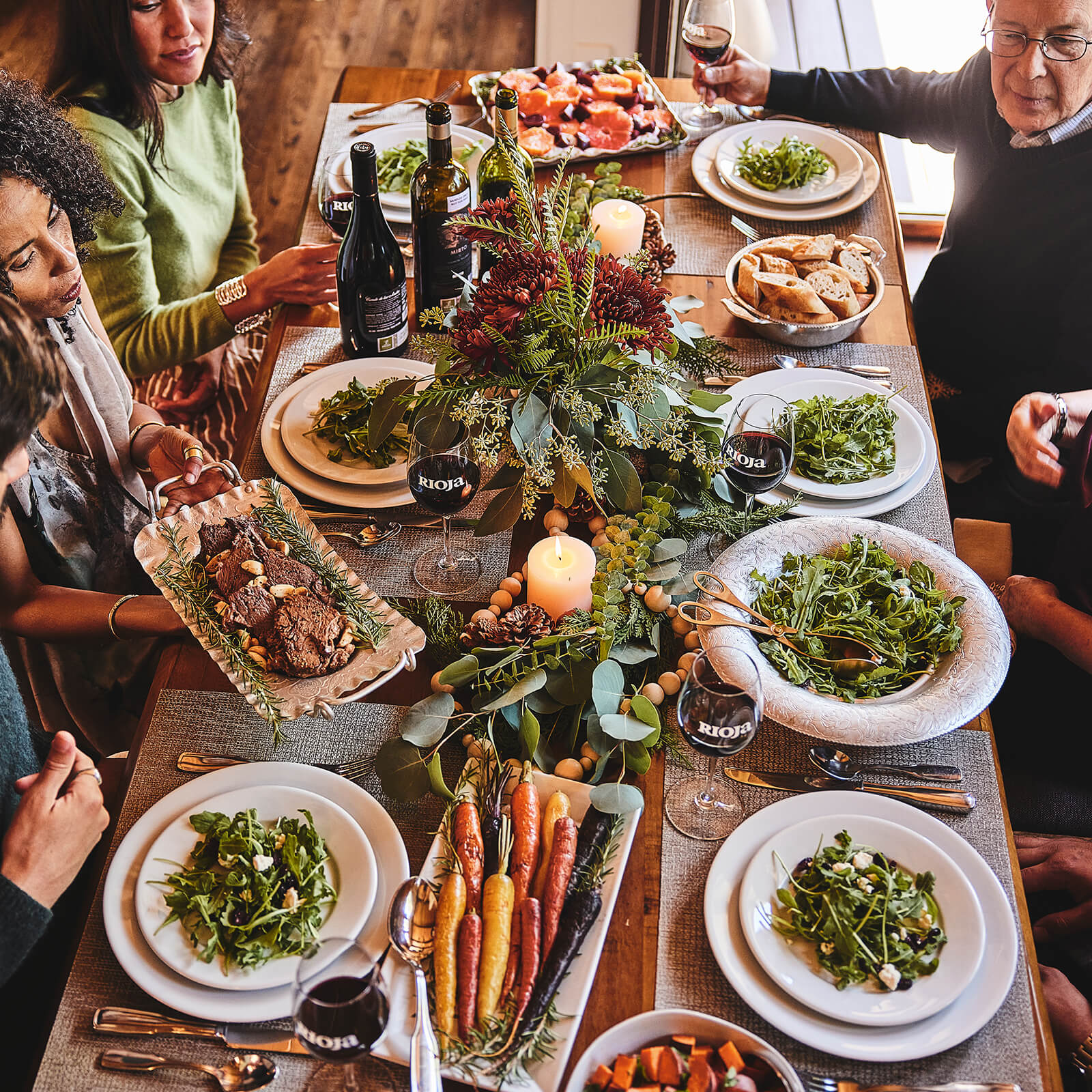 Holiday Gathering with food and wine at a table