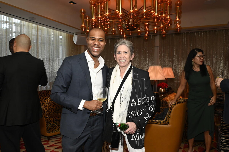 Guests smiling at ARTNews event